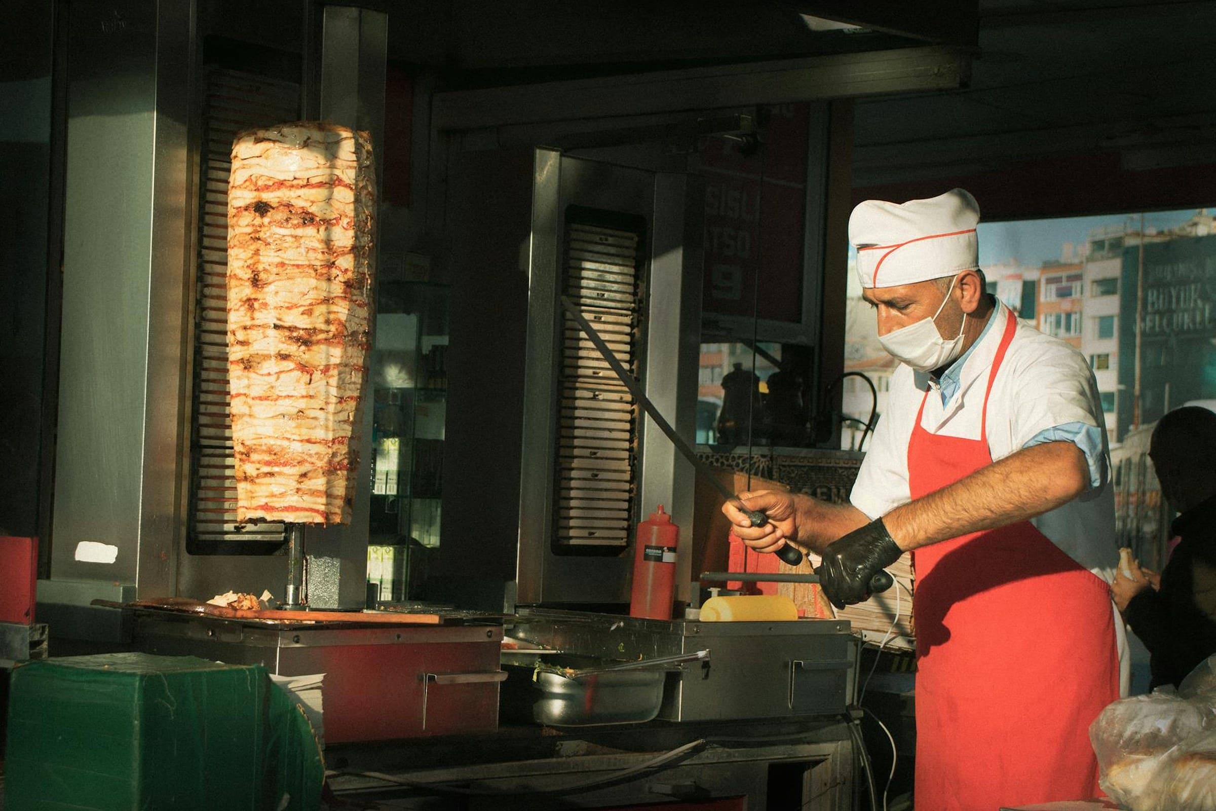 Chef grilling fresh kebabs