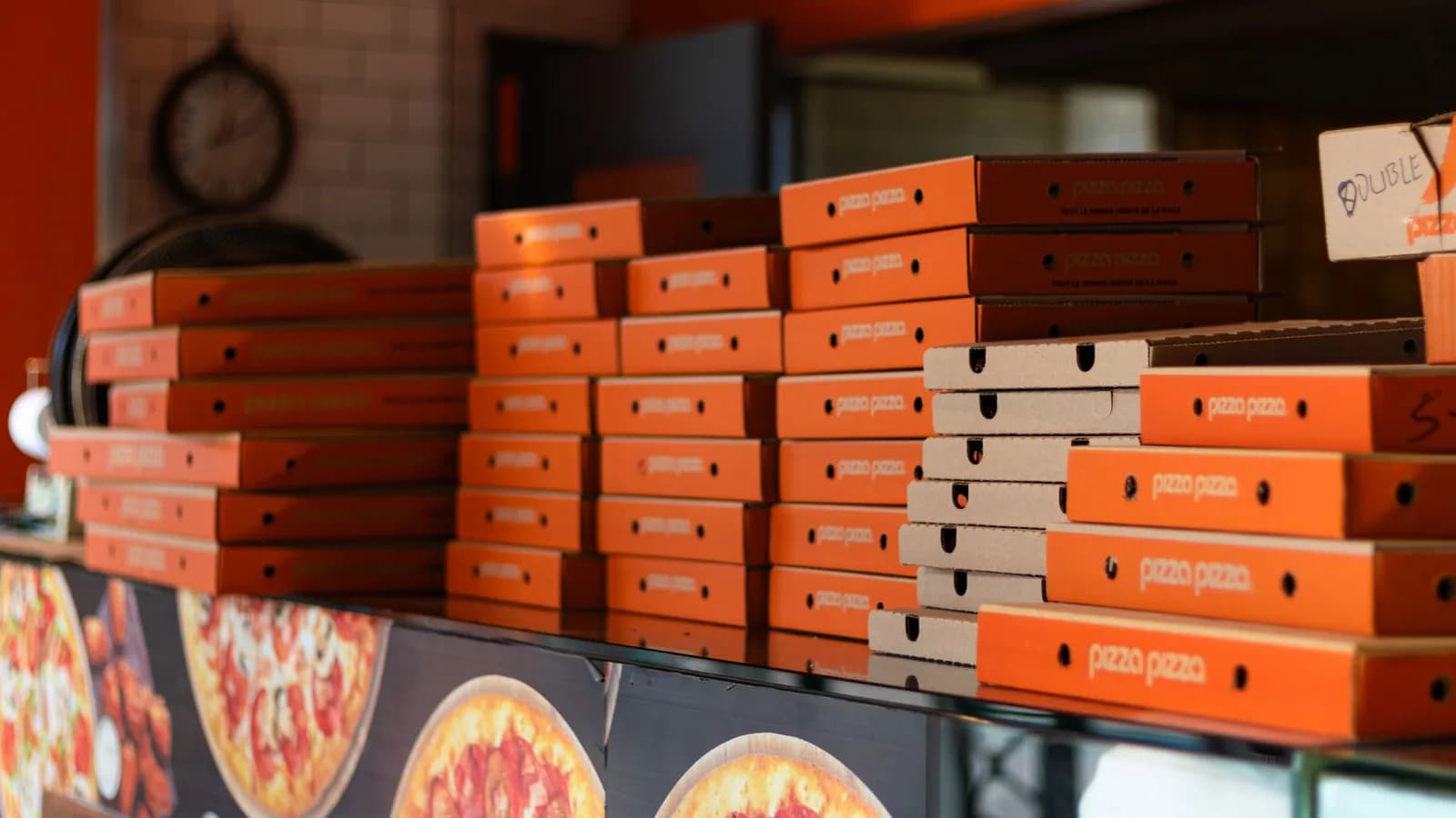 A hand-stretched Kebys pizza boxed for collection in Great Barr, near Sutton Coldfield