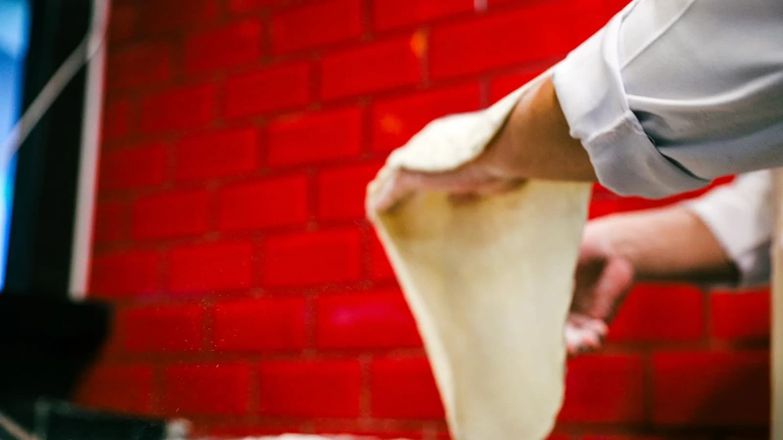 How Hand-Stretched Pizza Dough Is Made (and Why It Tastes Better)